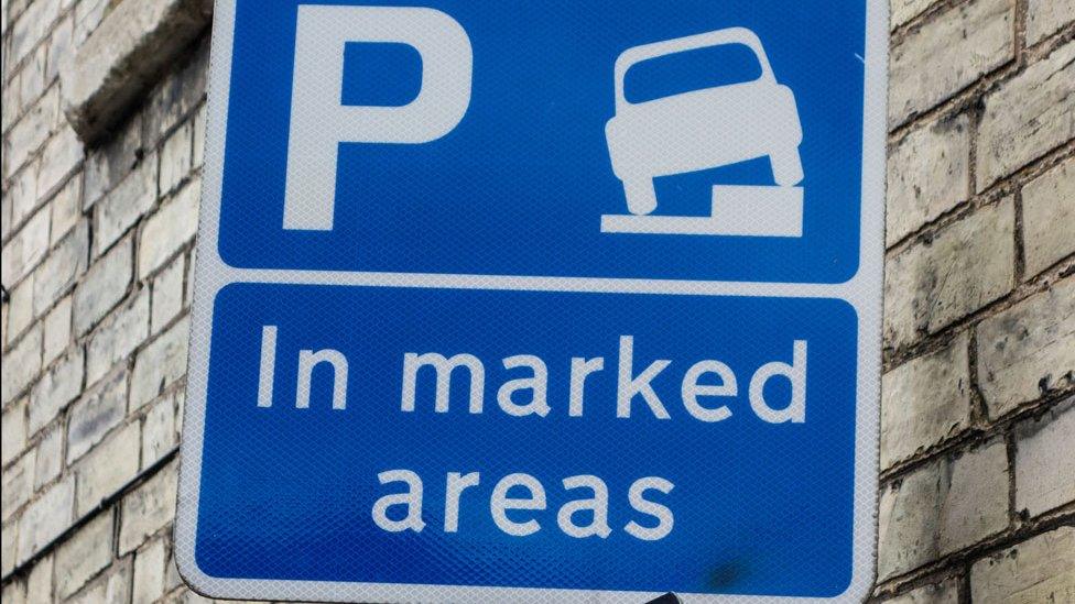 Pavement parking sign