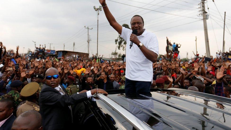 President Uhuru Kenyatta addresses his supporters at Burma market after his election win was declared invalid by the Supreme Court in Nairobi, Kenya, September 1, 2017.