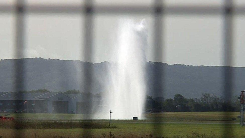 Water fountain on the runway