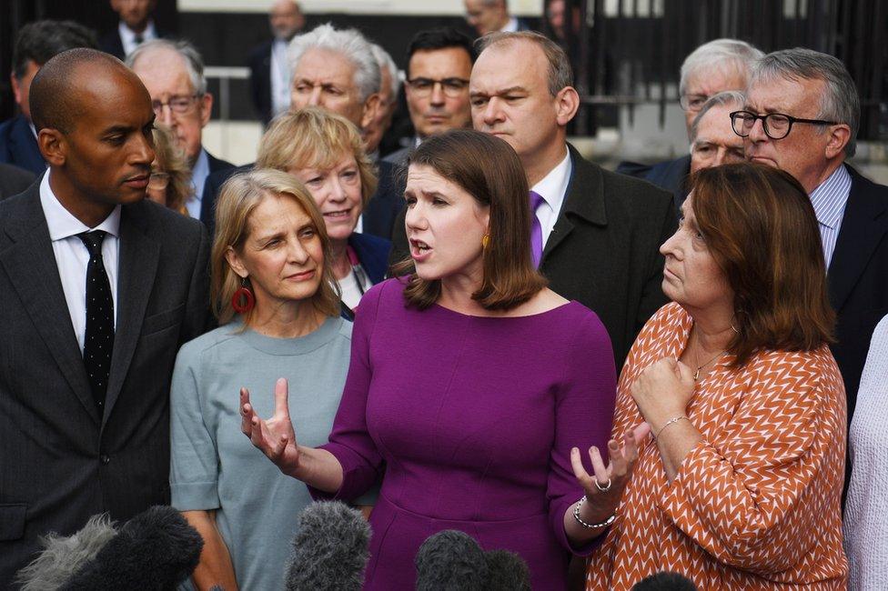 Liberal Democrat leader Jo Swinson speaks to colleagues