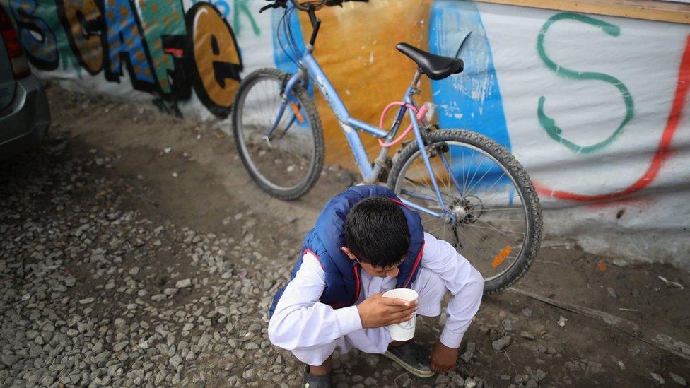 Boy in Jungle migrant camp in Calais