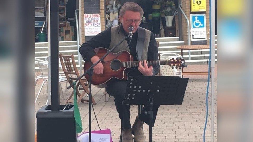 John busking on Bailey Head, Owestry