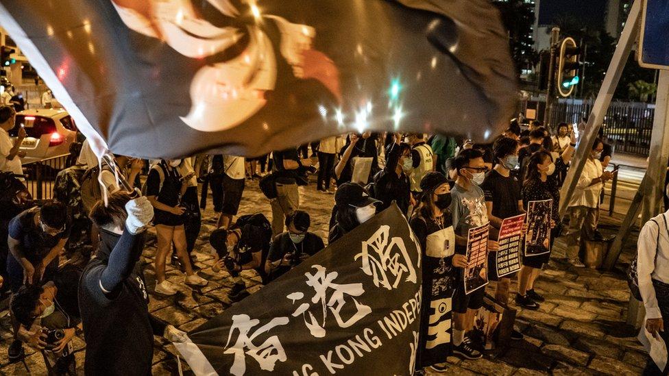 Pro-democracy activists outside the Lai Chi Kok prison on Wednesday