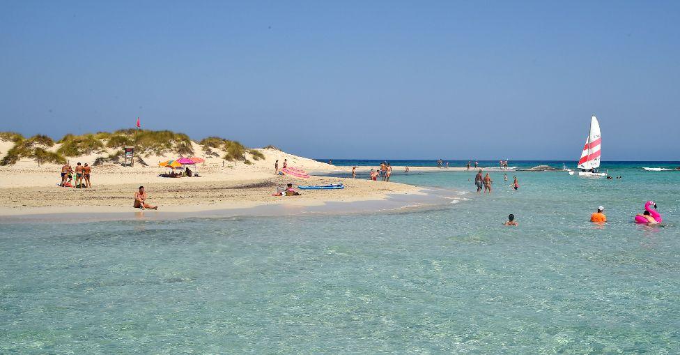 People gather at Isla de S'Espalmador on August 01, 2020 in Formentera, Spain.