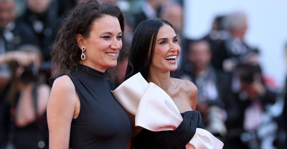 Coralie Fargeat and Demi Moore attend the Red Carpet of the closing ceremony at the 77th annual Cannes Film Festival at Palais des Festivals on May 25, 2024 in Cannes, France