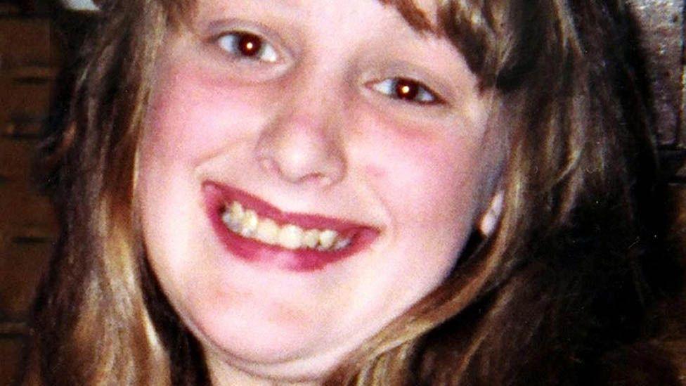 Close-up of Charlene Downes a young girl with long dark hair, smiling