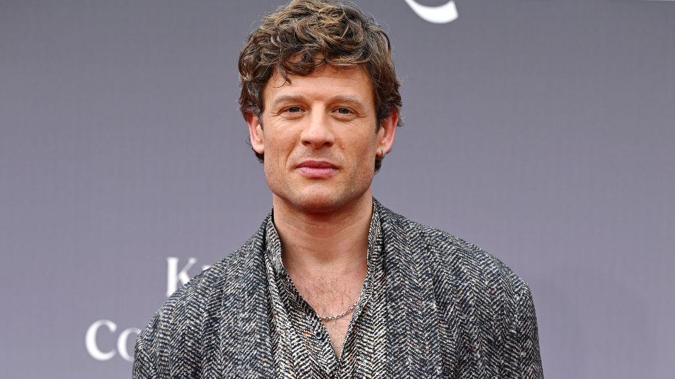 James Norton, wearing a black and white patterned shirt, attends the "King & Conqueror" Global Premiere at the BFI Southbank on August 14, 2025 in London, England
