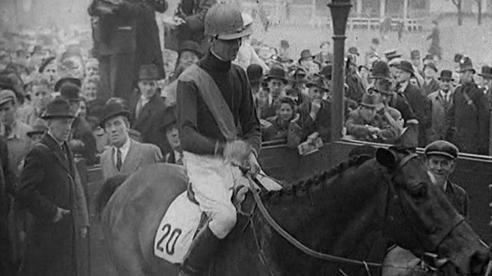 Jockey Mervyn Jones and his horse Bogskar after winning the Grand National, Aintree, Liverpool, 1940