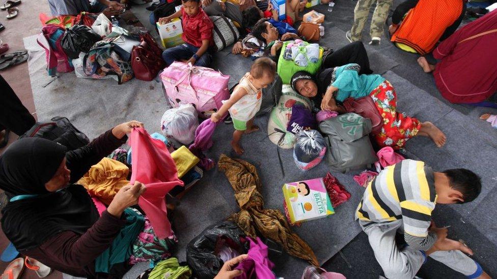 Residents evacuate from Sebesi Island at Tennis Court Kalianda in South Lampung, Indonesia on December 26, 2018