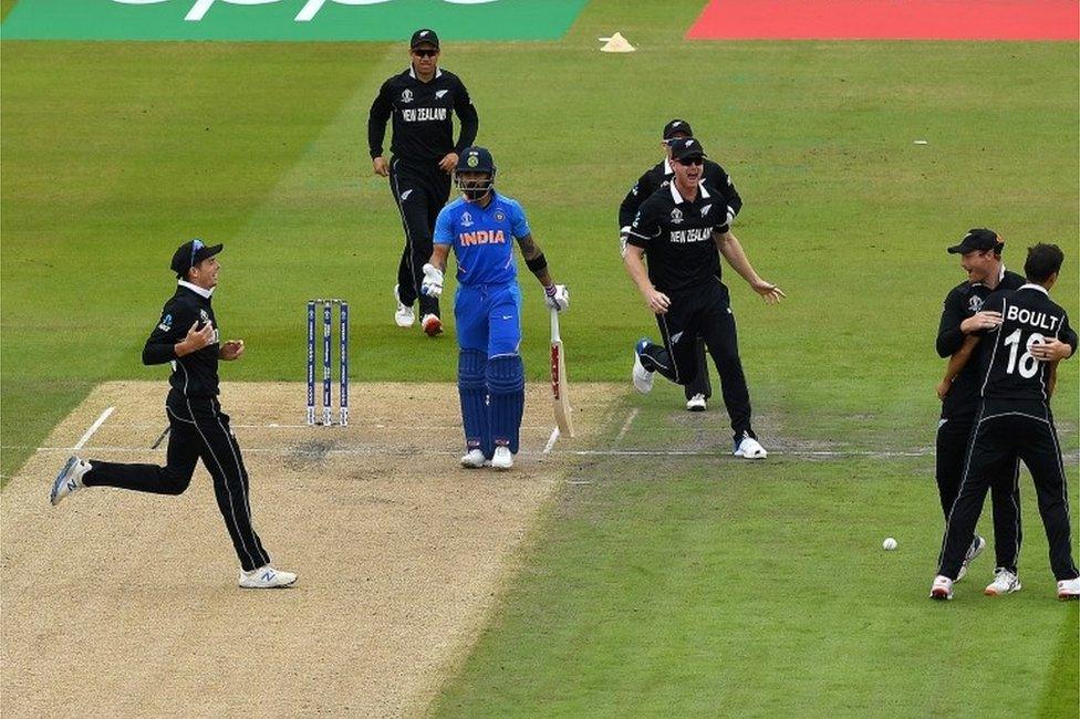 Trent Boult of New Zealand appeals successfully for the wicket of Virat Kohli of India during the Semi-Final match of the ICC Cricket World Cup 2019 between India and New Zealand at Old Trafford on July 10, 2019 in