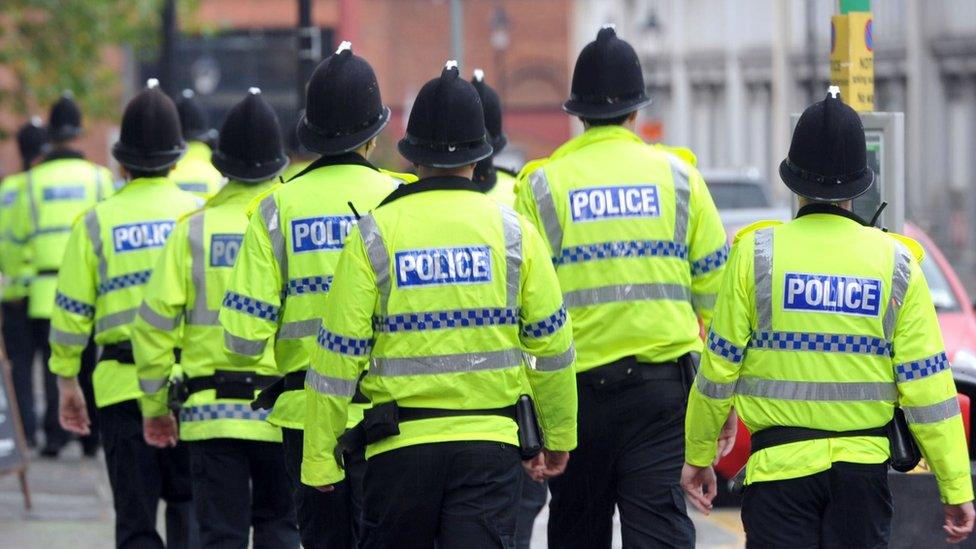 A group of police officers walking