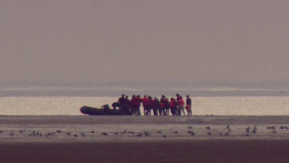 Migrants setting off from France in a boat