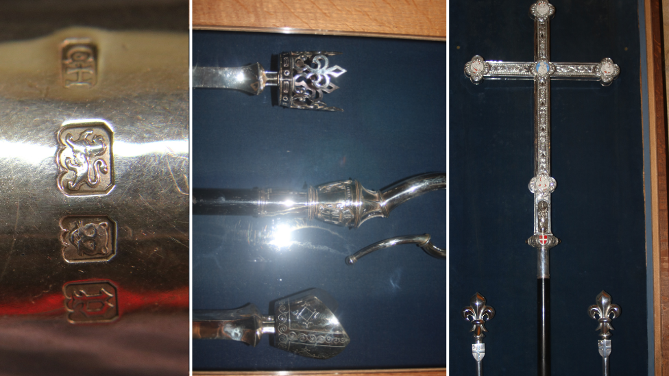 Solid silver items taken in the raid including cross and crook in display cabinets