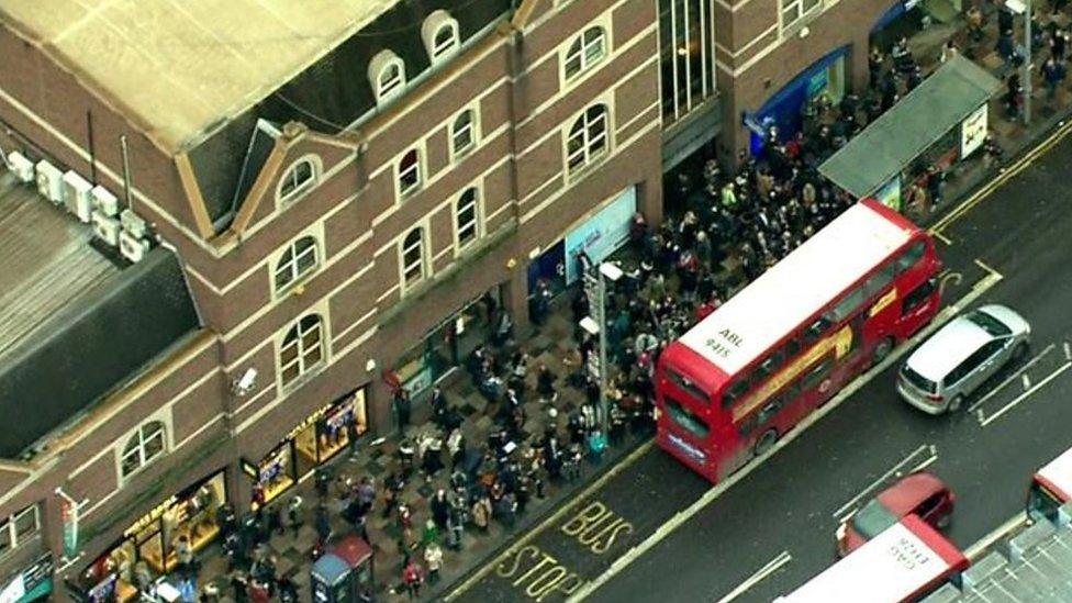 Queues of people