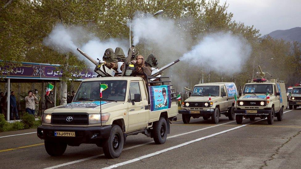 Troops spray disinfectant featured in the Army Day parade in Tehran, Iran (17 April 2020)