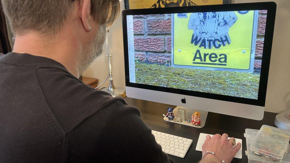 Steve Rolf editing his photograph