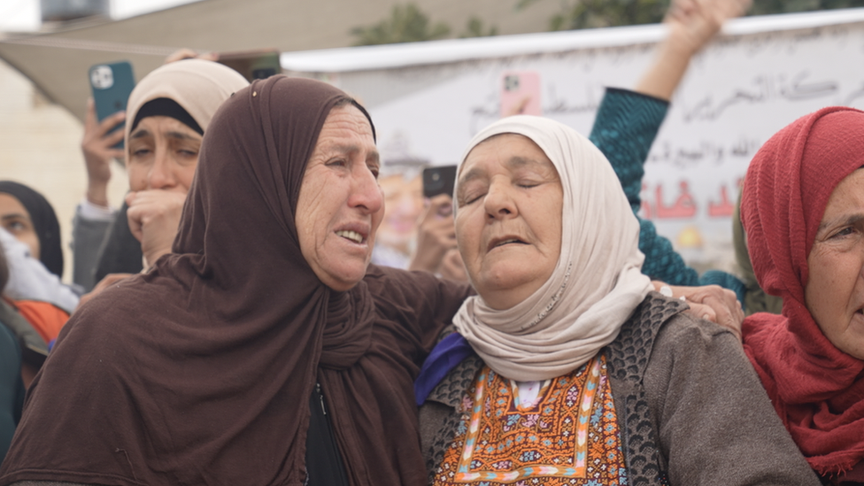 Relatives mourning