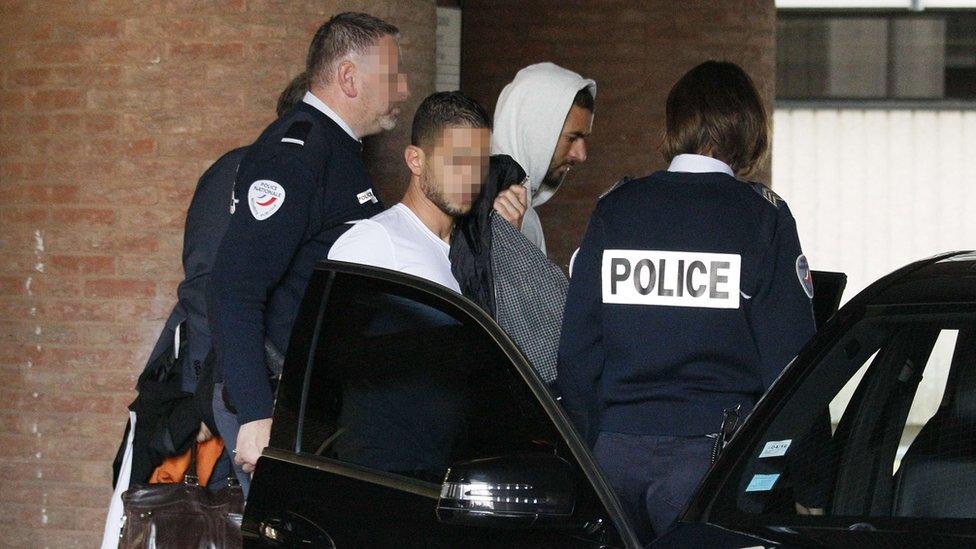 Real Madrid's French striker Karim Benzema leaves the court house in Versailles, near Paris, on 5 November 2015