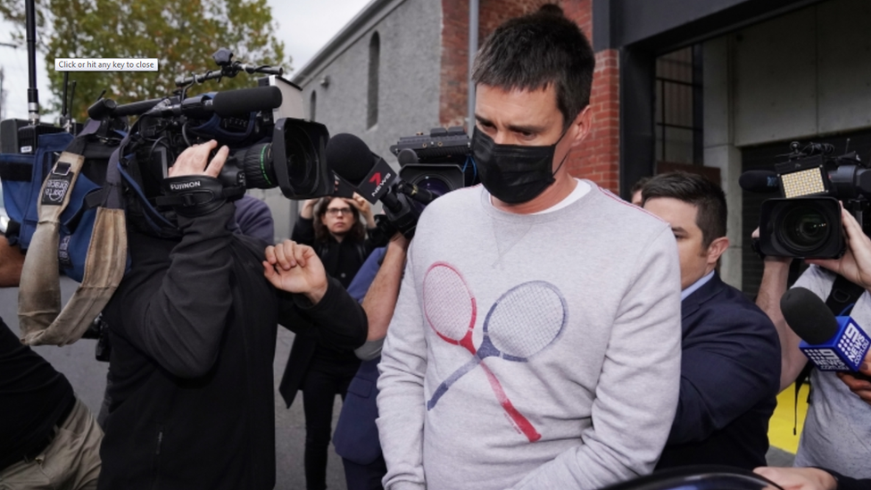 Melbourne man Richard Pusey surrounded by media as he's arrested by police