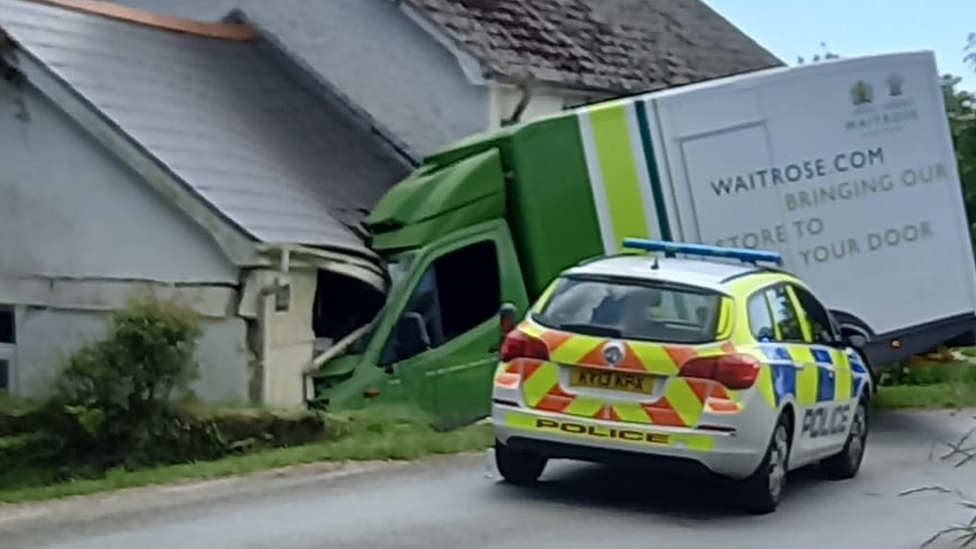 Van crashing into house