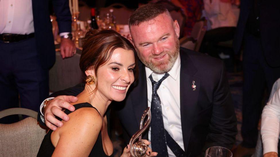 Coleen Rooney pictured with husband Wayne.