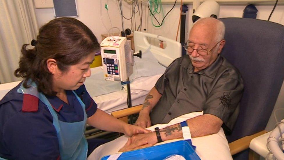 Patient and nurse in hospital