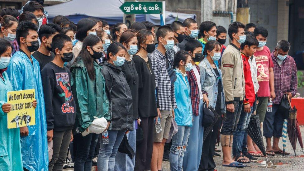 Anti-military coup protesters take a moment of silence to show the respect to the people who died during the summer revolution. A massive crowd took to the streets of Nankham to protest against the military coup and demanded the release of Aung San Suu Kyi. More than 769 people died since the military coup in February 1.