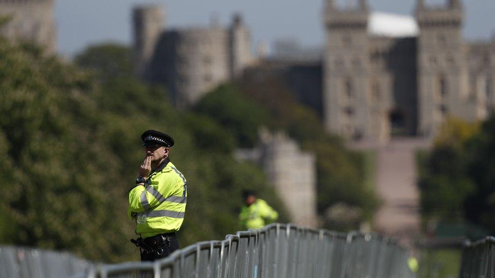 Police patrol along the Long Walk outside Windsor Castle in Windsor