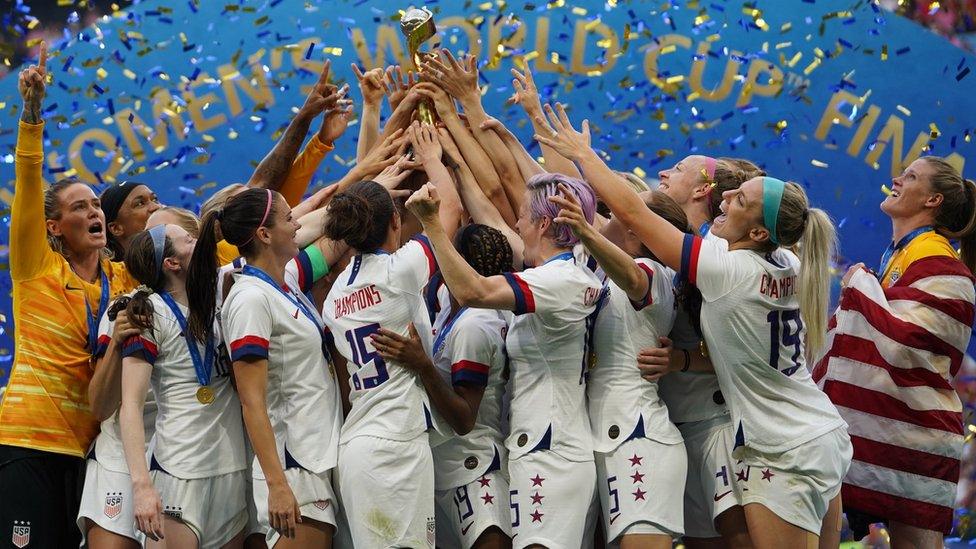 USA players celebrating winning the world cup.