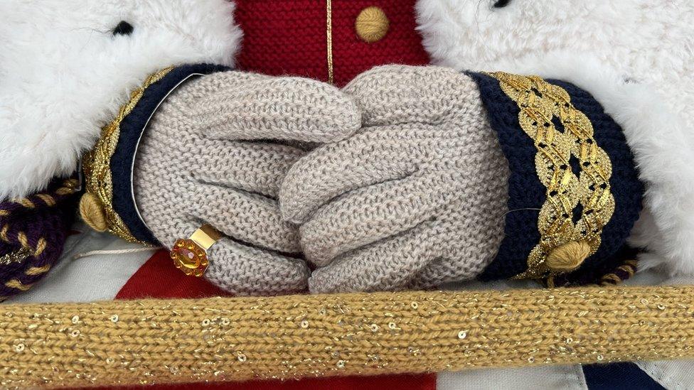 Knitted King Charles' hands