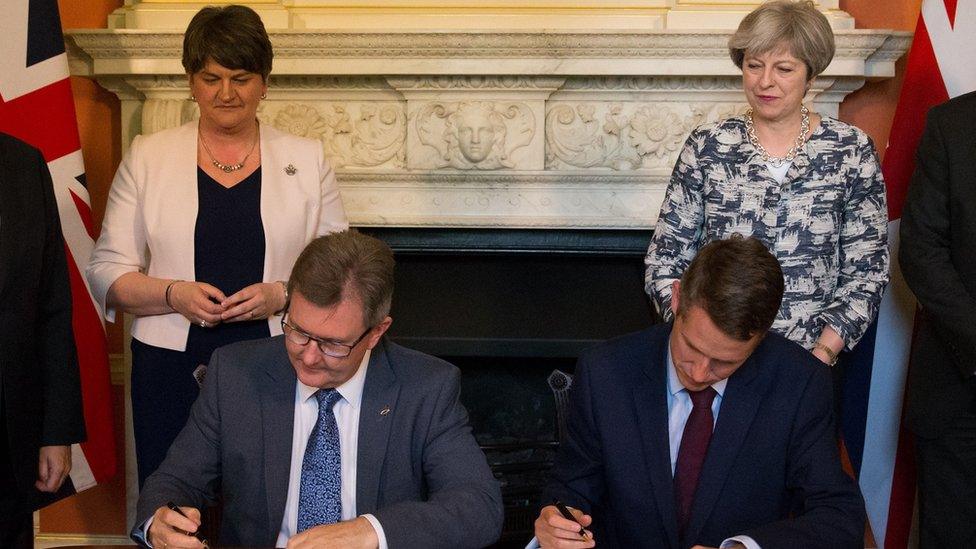 The DUP and Conservative party sign their confidence and supply agreement