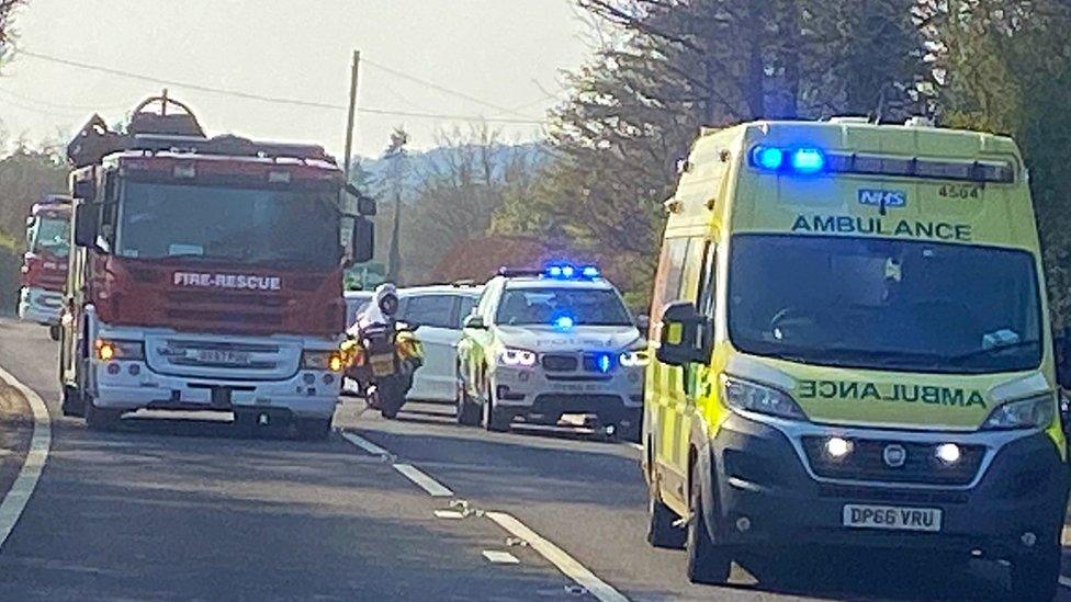 Fire engines and ambulance at the scene of the crash