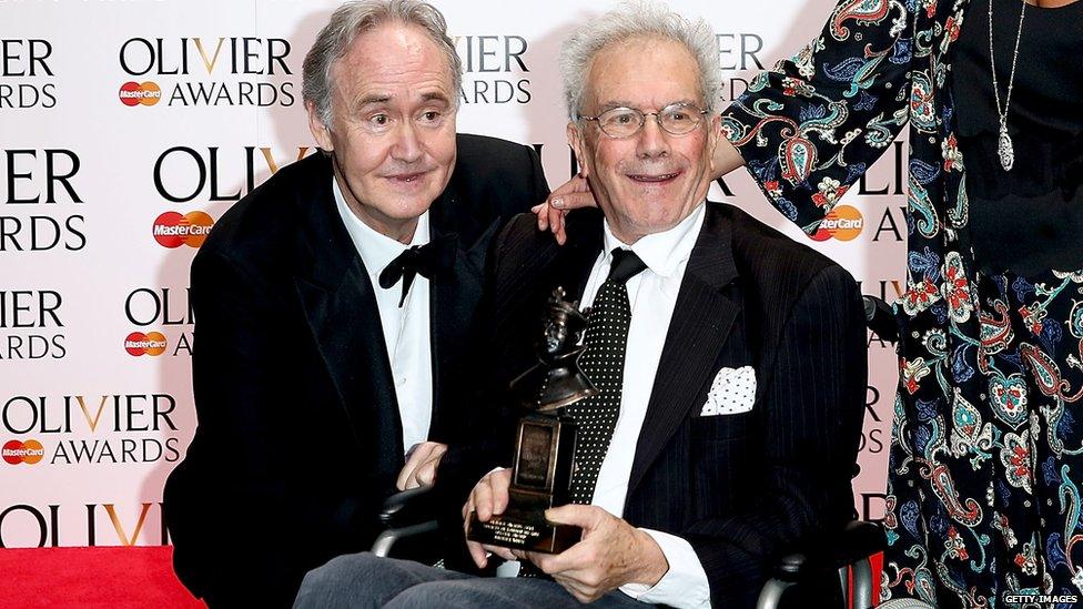 Michael White (r) poses with Nigel Planer at the Laurence Olivier Awards in 2014