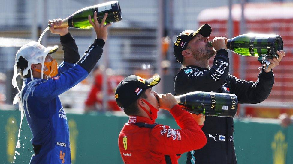 Lando Norris prefers the taste of milk to champagne. Seriously, he does.