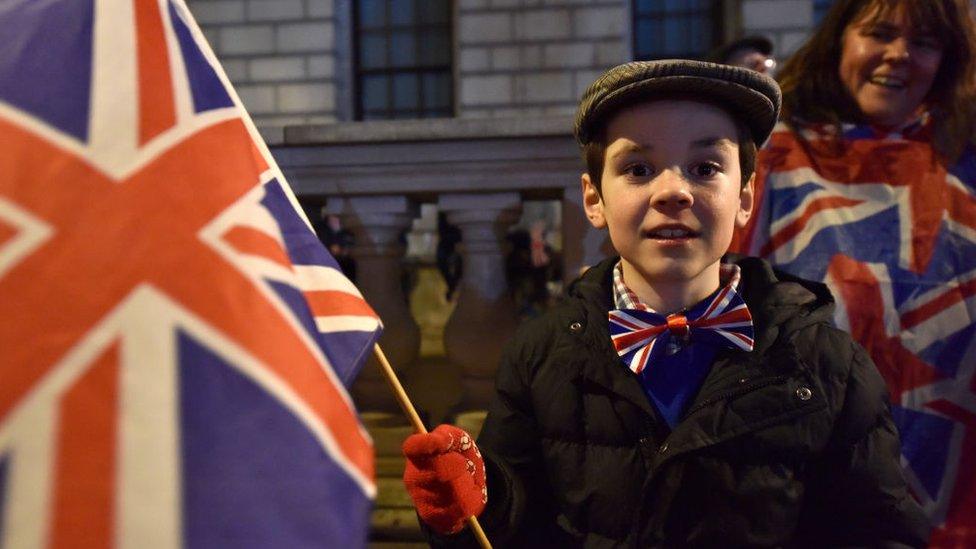 boy-dressed-in-union-jack-clothes-and-flat-cap