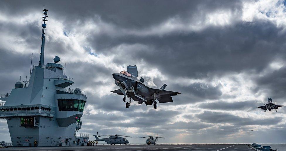 An F-35B Lightning jet landing on HMS Queen Elizabeth