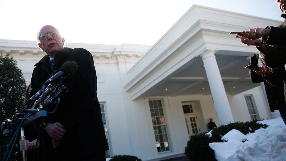 Bernie Sanders answers questions from reporters outside the White House