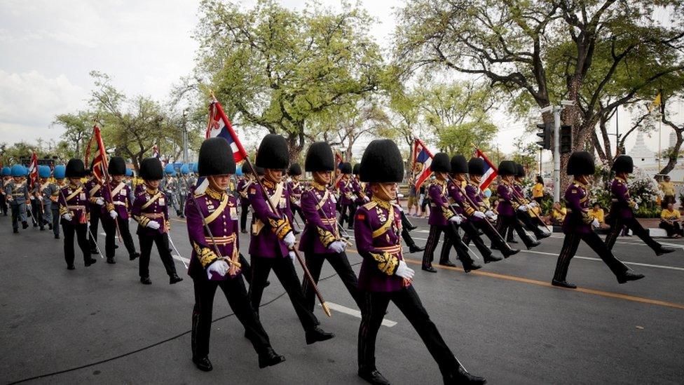 Thai Royal guards march during the coronation of Thai King Maha Vajiralongkorn Bodindradebayavarangkun outside the Grand Palace