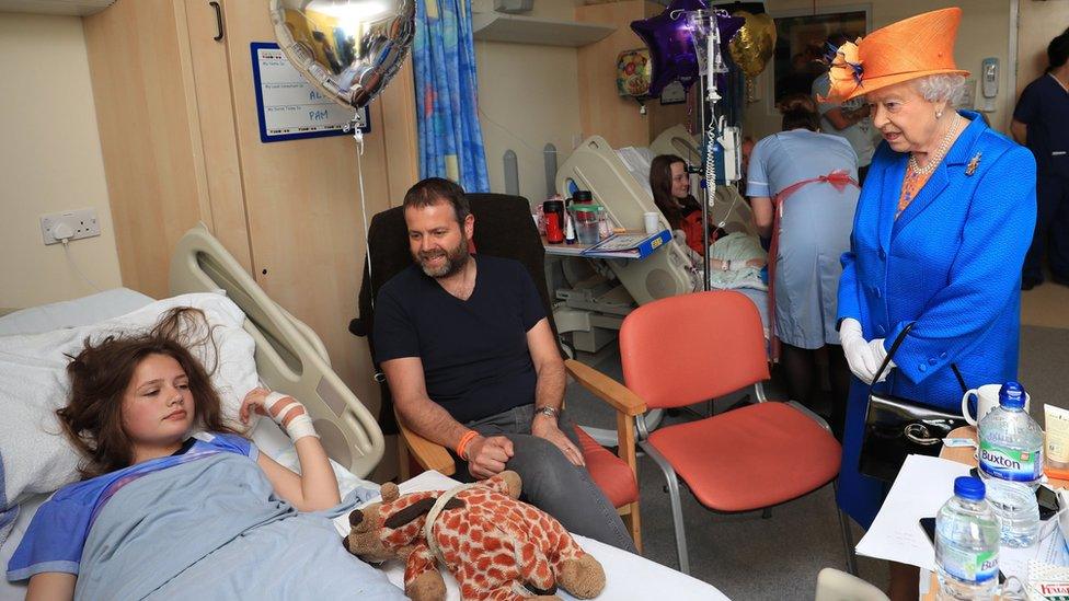 The Queen speaking to Evie Mills at Manchester Children's Hospital