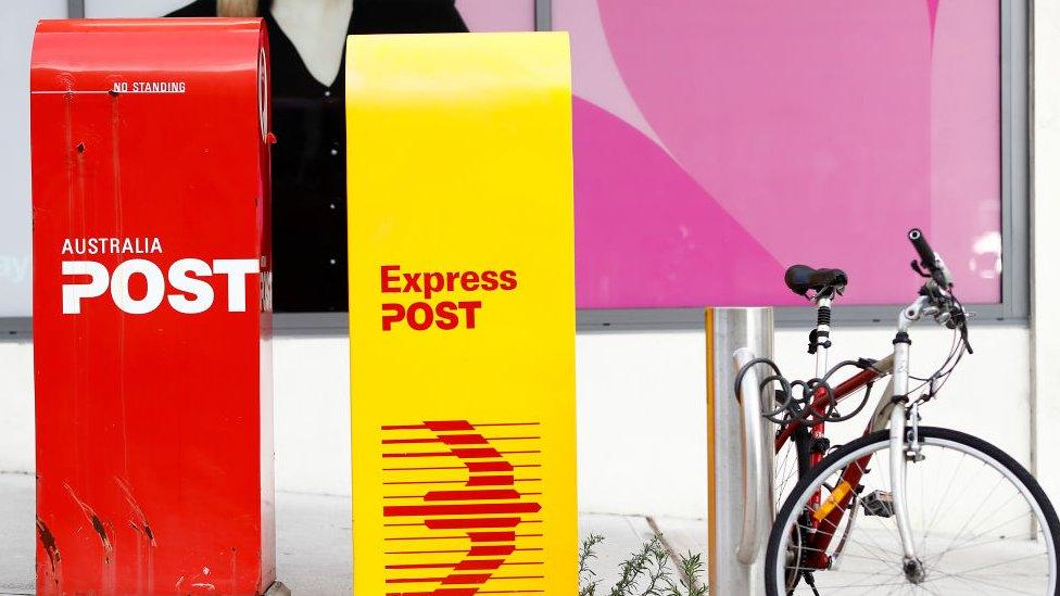 Australia Post mail boxes on a street in Melbourne