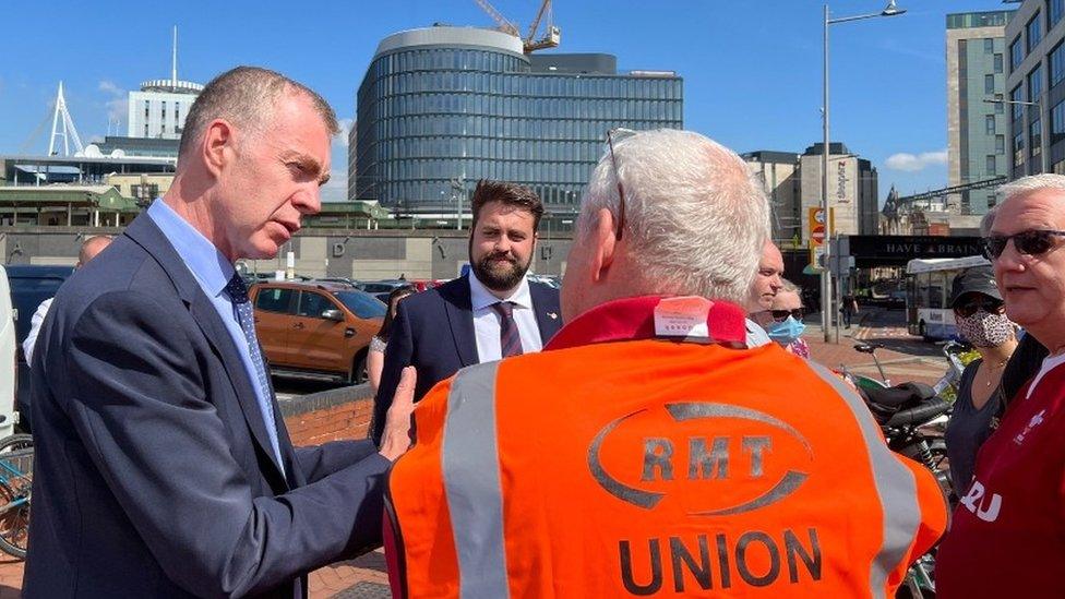 Plaid Cymru leader Adam Price speaking to striking workers in Cardiff