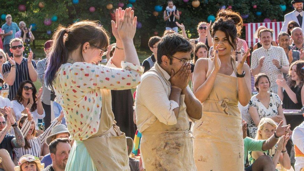 The moment Rahul was announced winner, celebrated by fellow finalists Kim-Joy (left) and Ruby (right)