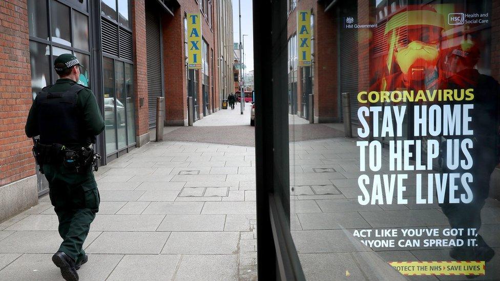 Police patrol in Belfast during lockdown