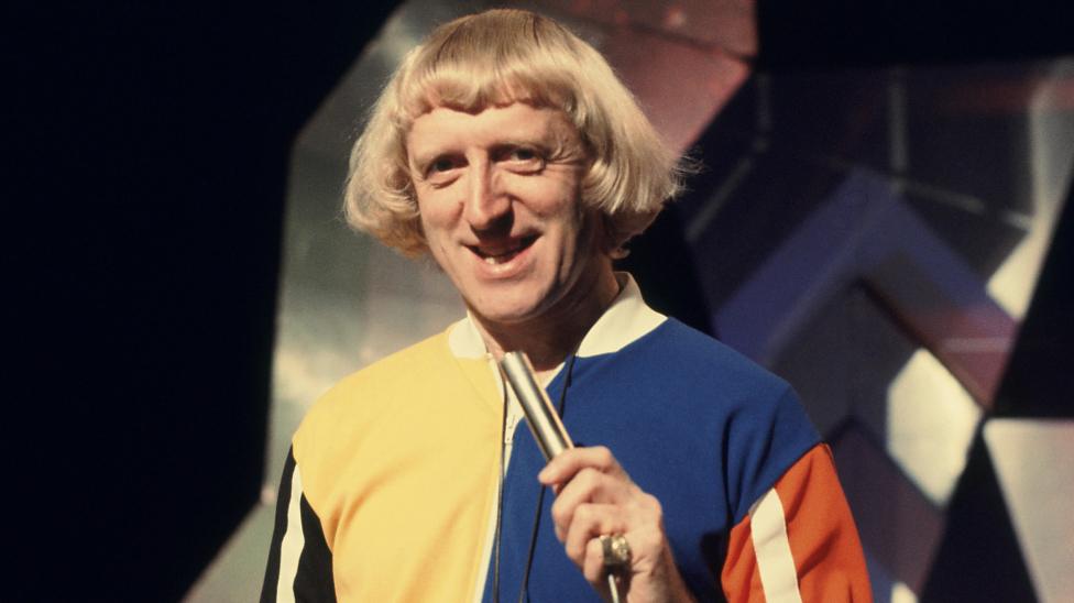 Disc Jockey Jimmy Savile presenting Top Of The Pops in 1975