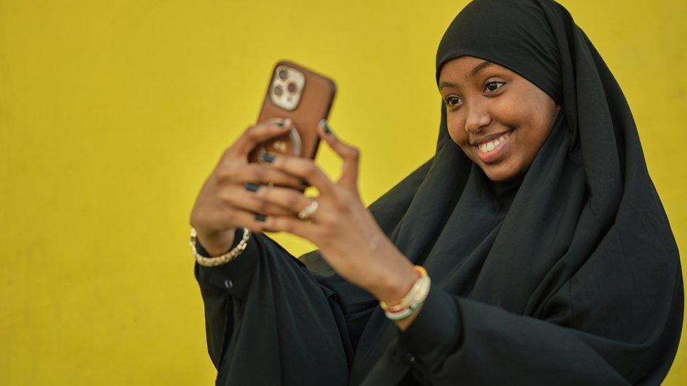 Woman taking a selfie