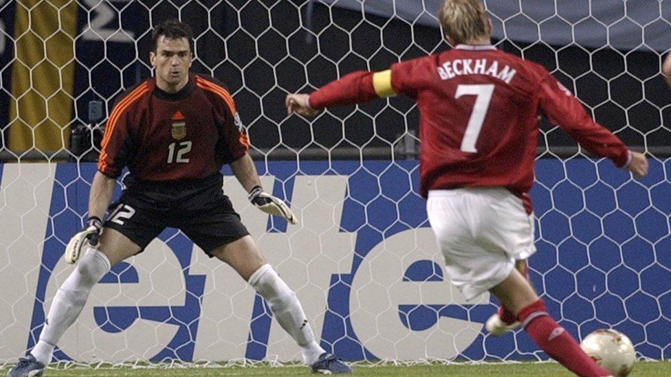 David Beckham scores a penalty against Argentina.