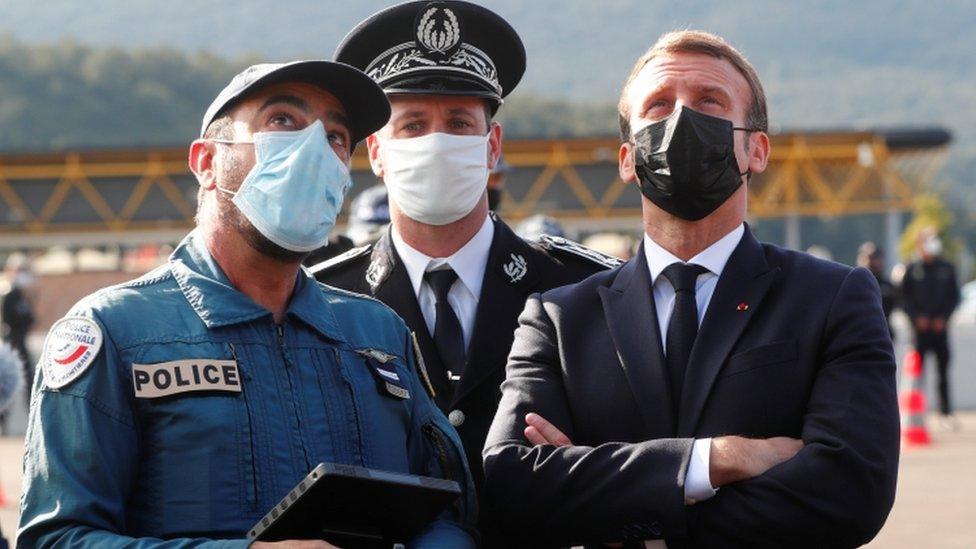 President Macron speaks to security officials at Le Perthus on the border with Spain on 5 November 2020