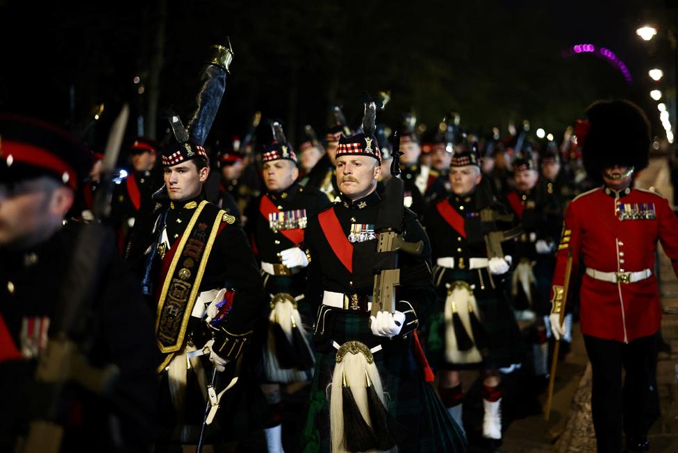 Members of the military take part in a full overnight dress rehearsal of the Coronation Ceremony.