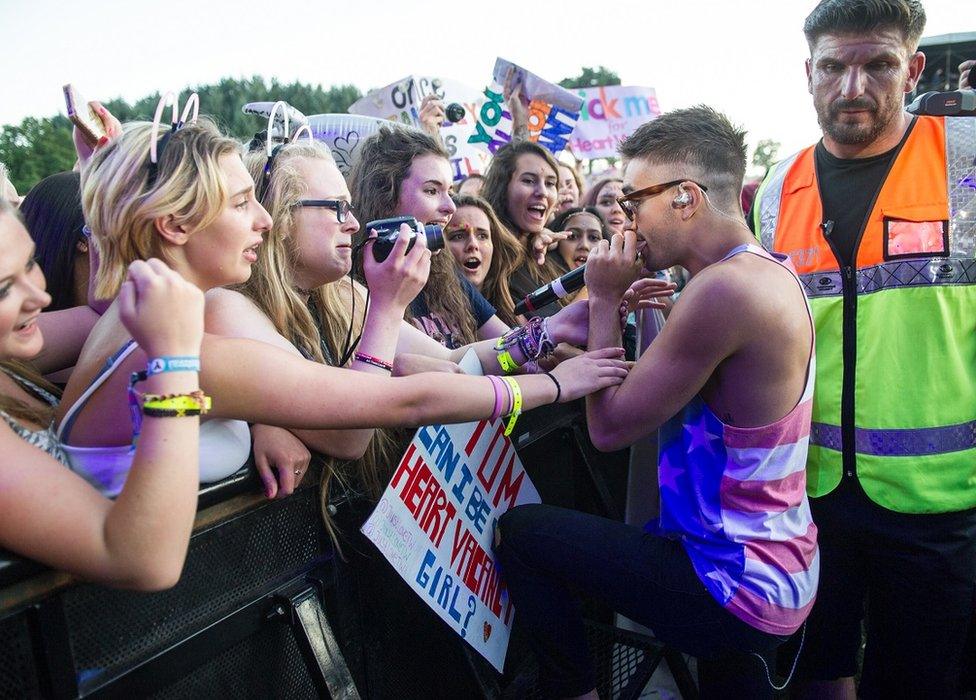 Tom Parker performing in 2014