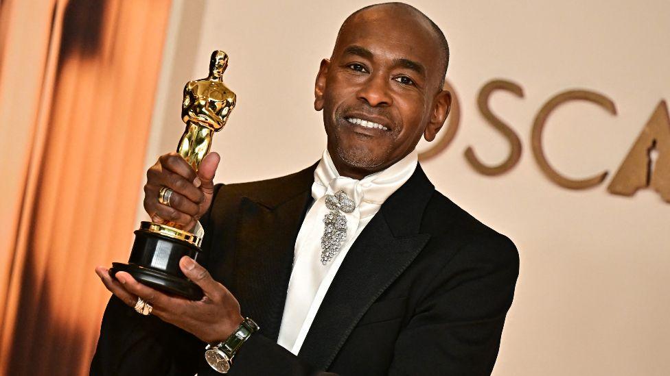 US costume designer Paul Tazewell poses in the press room with the Oscar for Best Costume Design for "Wicked" during the 97th Annual Academy Awards at the Dolby Theatre in Hollywood, California on March 2, 2025